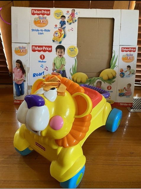 fisher price walk and ride lion